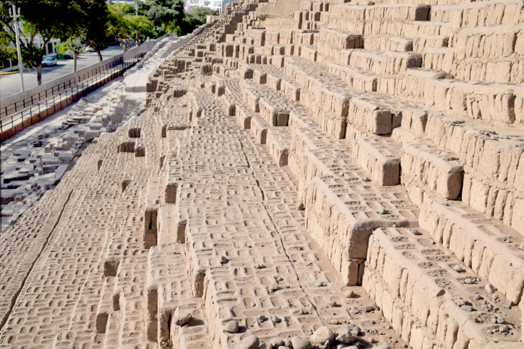 Huaca Pucllana pyramid construction in a closer view. Car in upper left for scale.