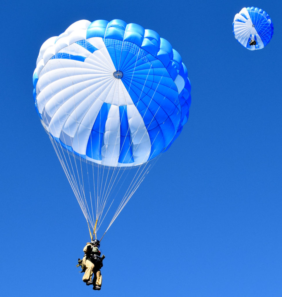 McCall smokejumpers doing a refresher jump from a Sherpa aircraft.