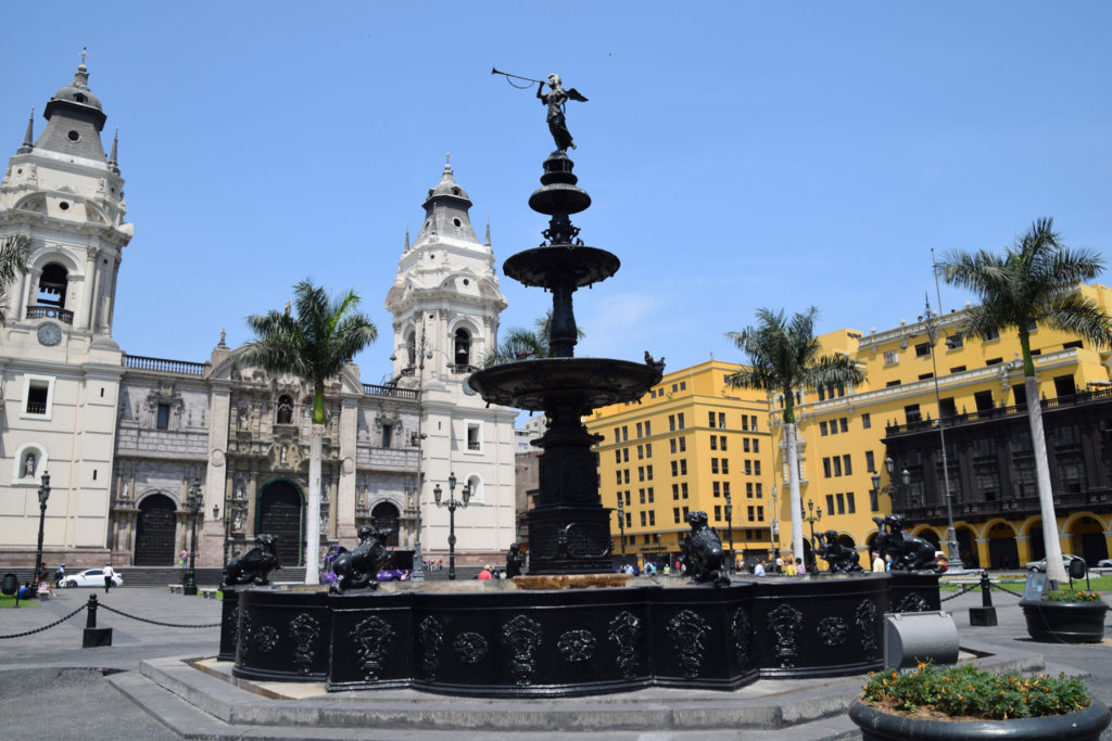 The Plaza de Armas in the Historic Centre of Lima. The bronze fountain, erected in 1650, sits in the Plaza's center. The Cathedral of Lima is seen here directly in back of the fountain.